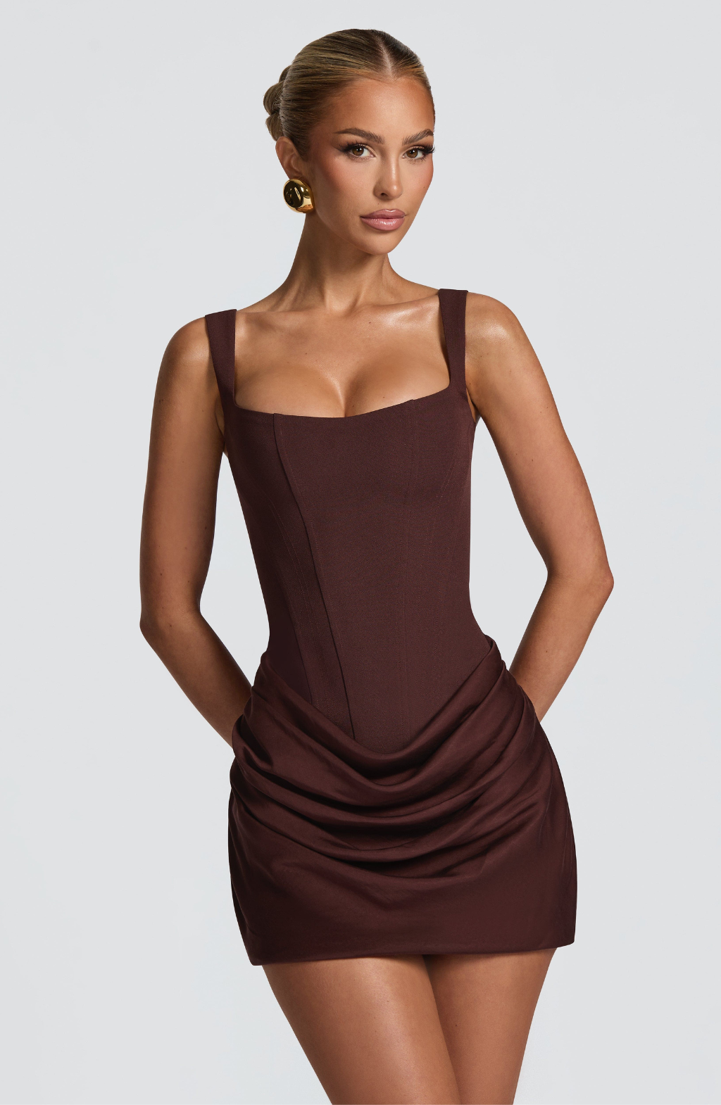 Mocha corset mini dress with ruched skirt, front view on model