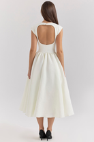 Ivory full-skirt midi dress, back view showing cutout detail