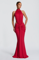 Red halter maxi dress with cutout waist, front view on model