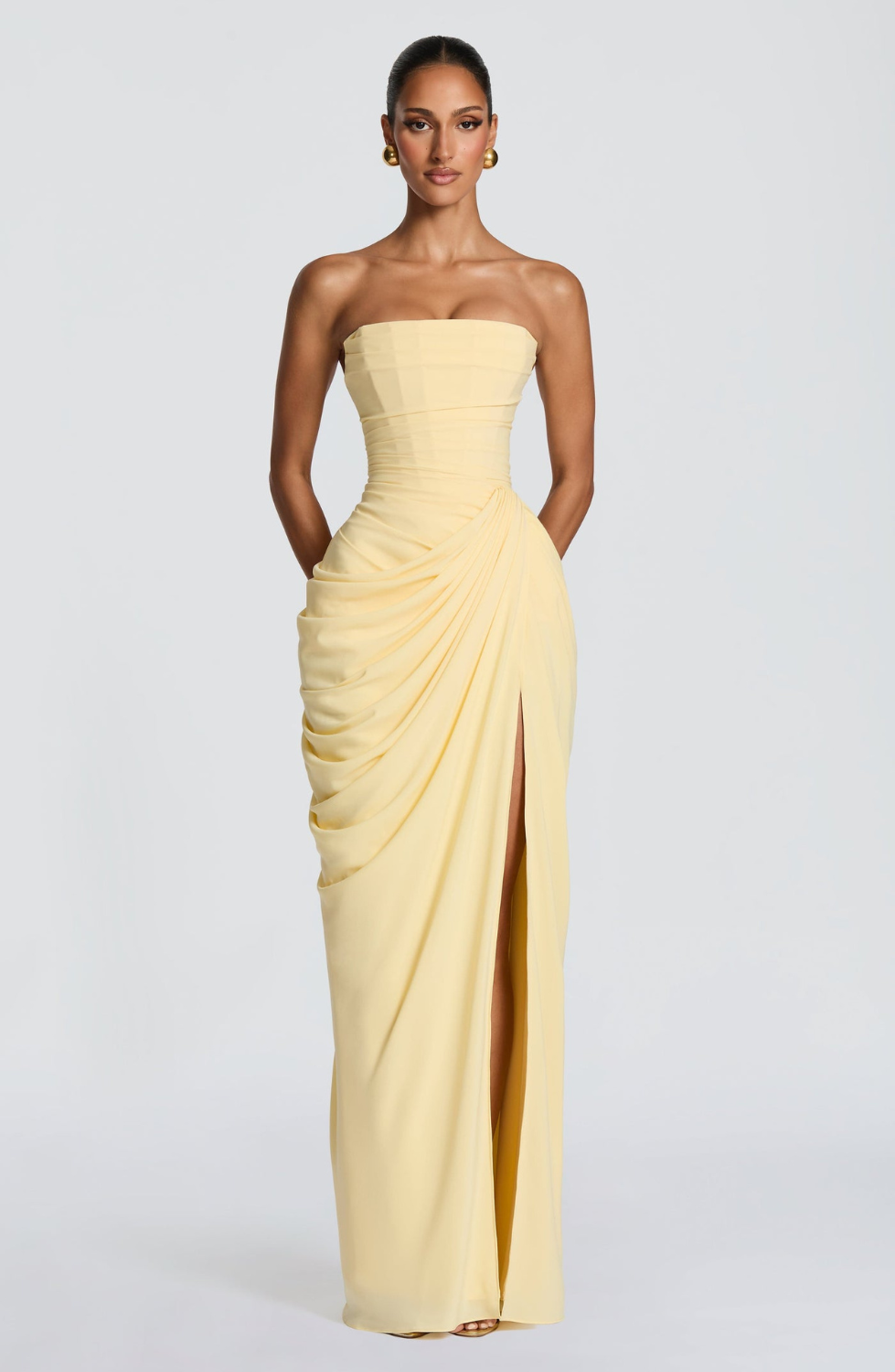 Lemon strapless maxi dress with draped skirt, close front view on model
