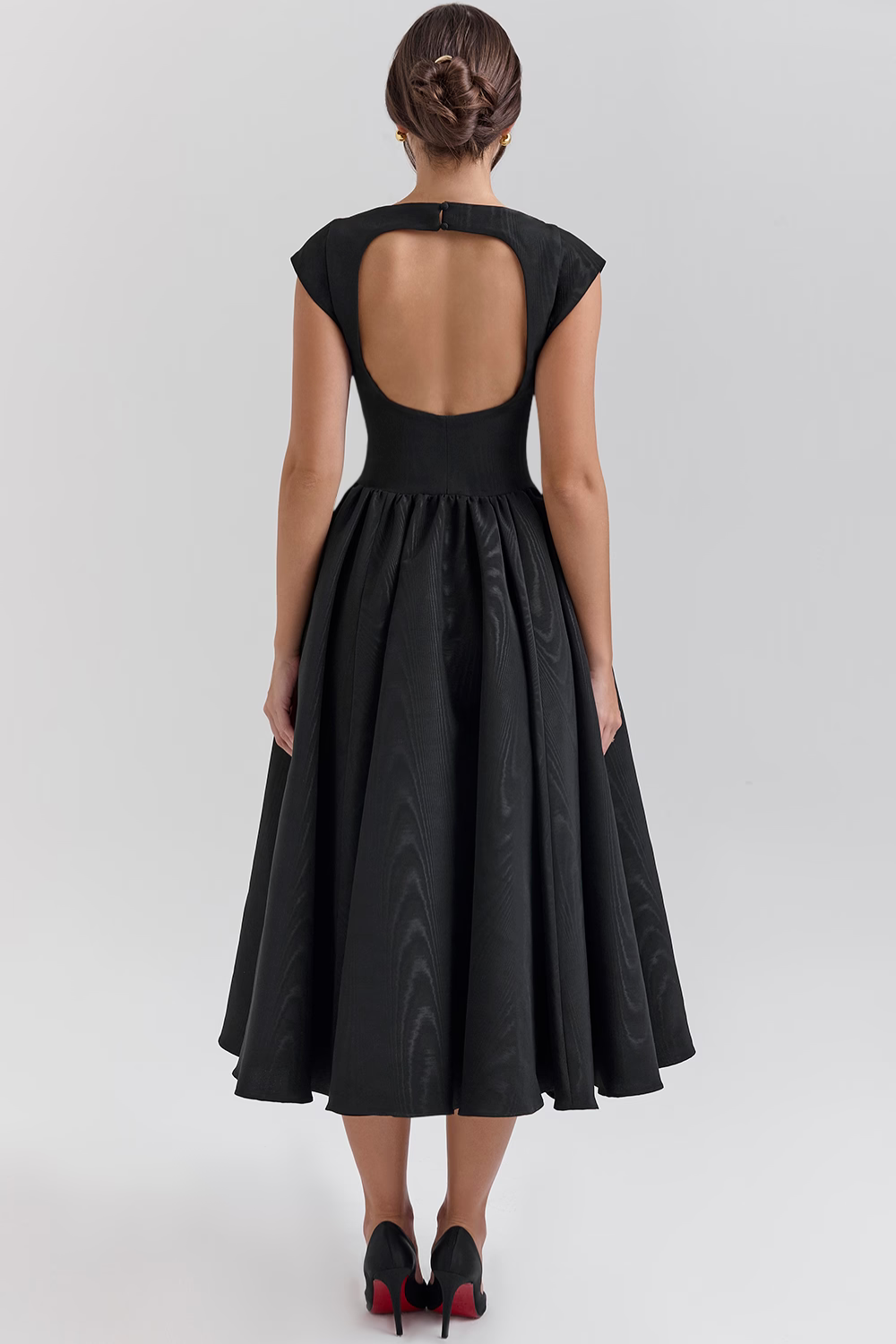 Black full-skirt midi dress, back view showing cutout detail