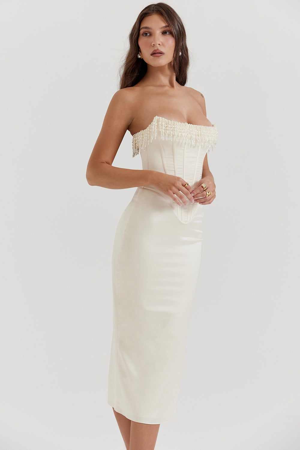 Ivory beaded-fringe corset midi dress, side view on model