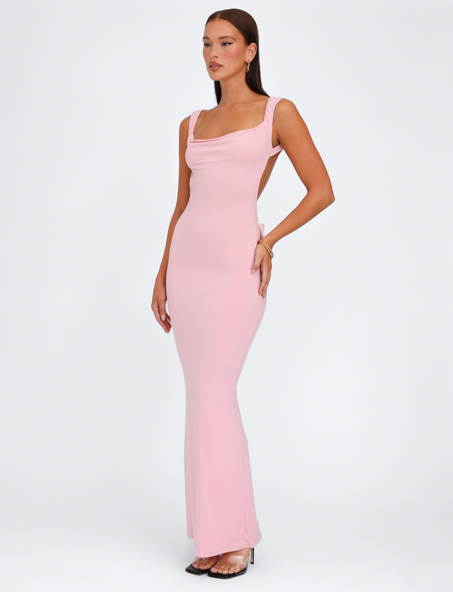 Baby pink maxi dress with heels, angled front view on model