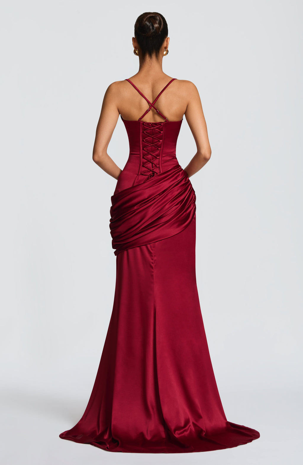 Burgundy satin gown with corset lace-up back, back view on model