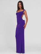 Purple maxi dress with side bow cutout, side view on model