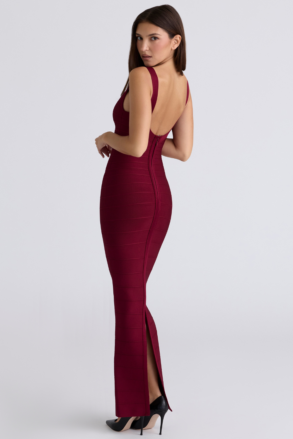 Ruby red bandage maxi dress with low back and leg slit, back view