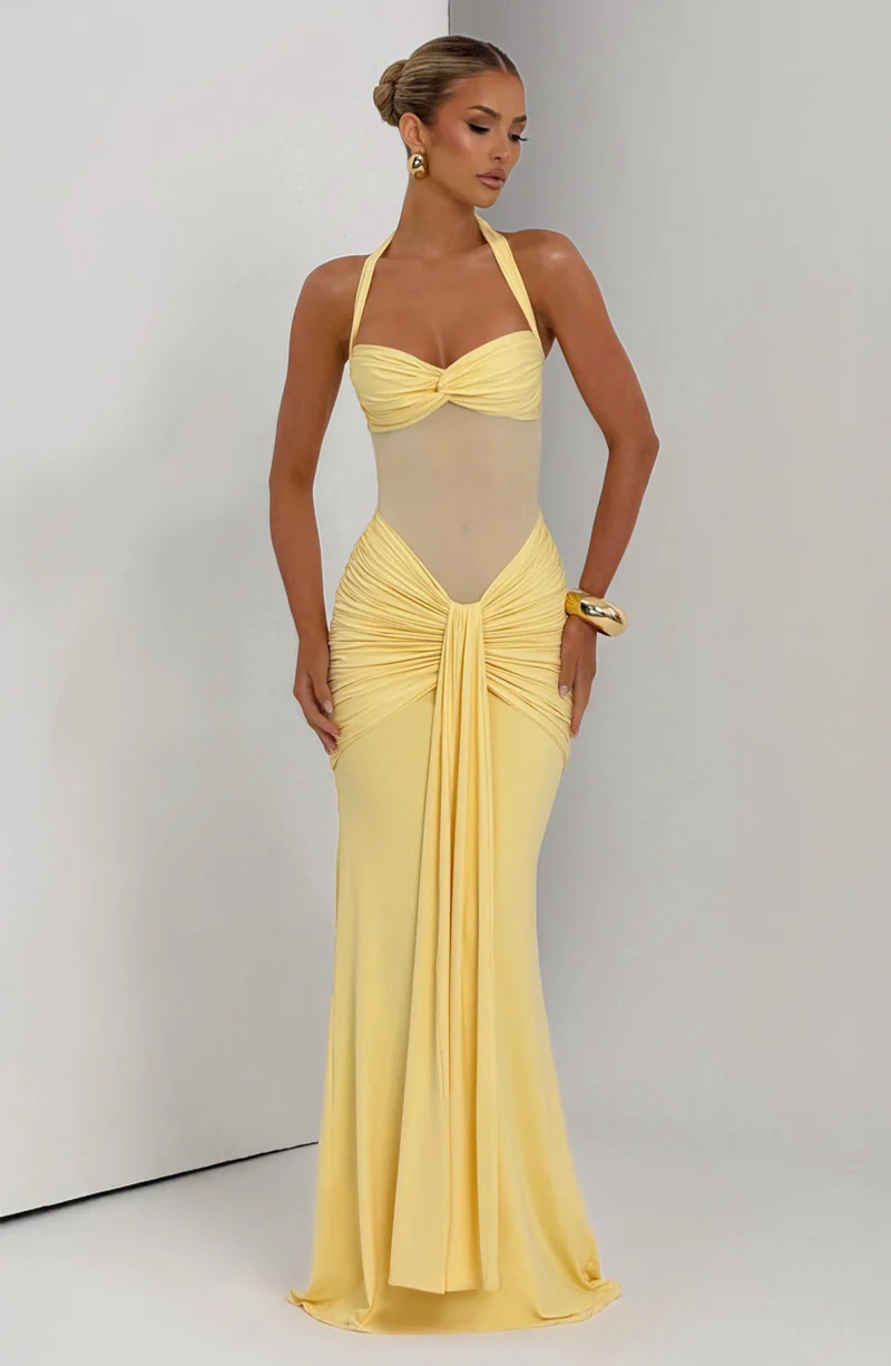 Lemon halter neck maxi dress, three-quarter view on model