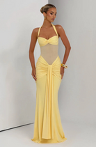 Lemon halter neck maxi dress, three-quarter view on model