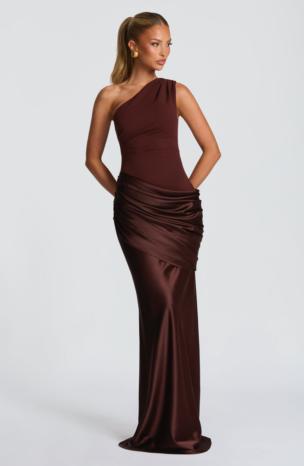 Mocha satin one-shoulder maxi dress, front view hands behind back