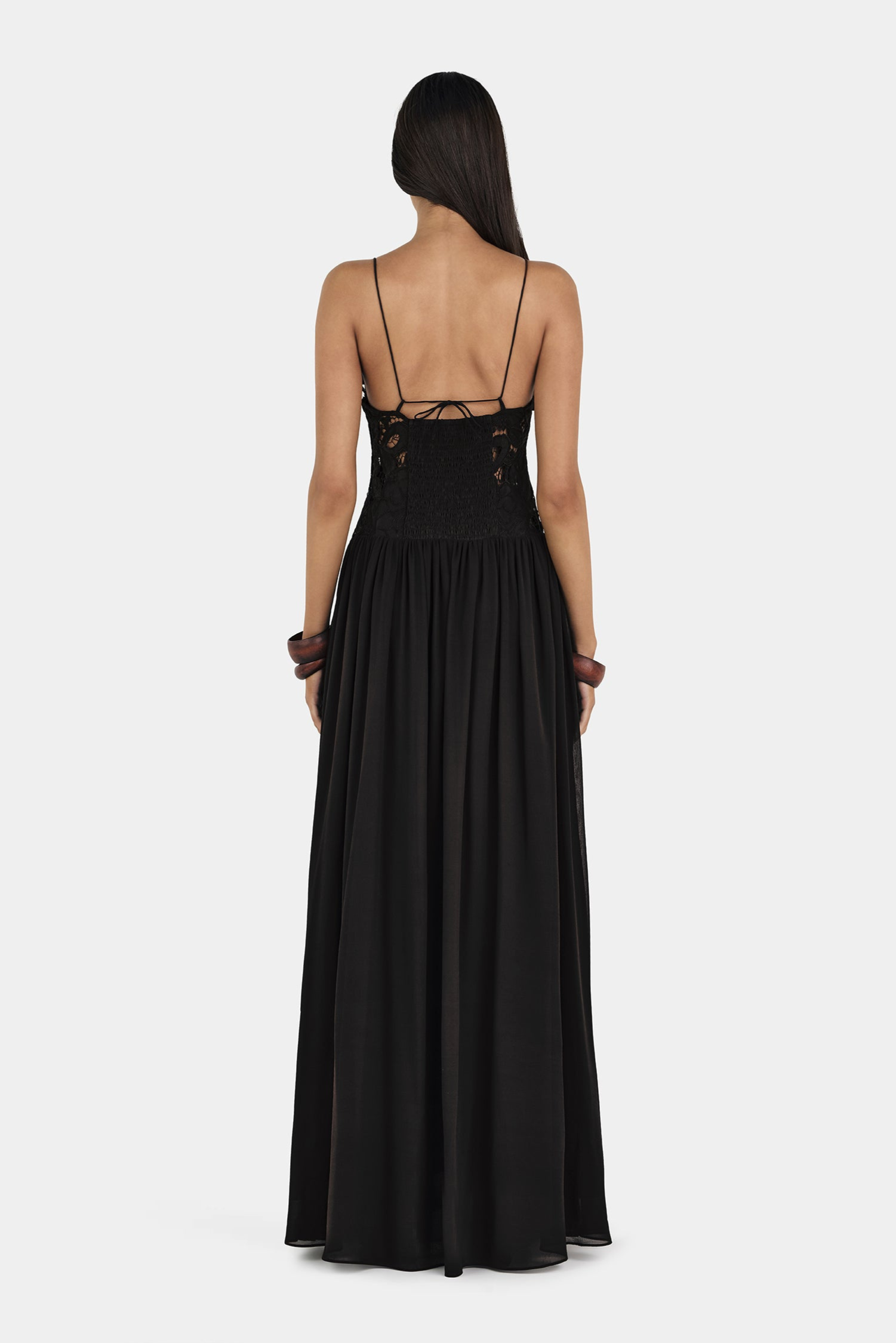 Black lace maxi dress with tie-back bodice, back view on model