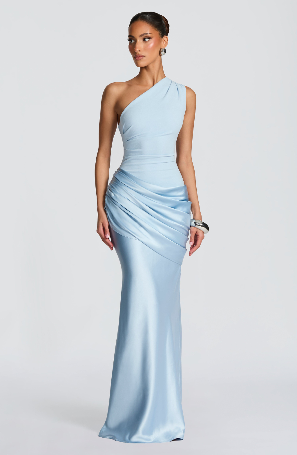 Ice blue satin one-shoulder maxi dress on model, side view
