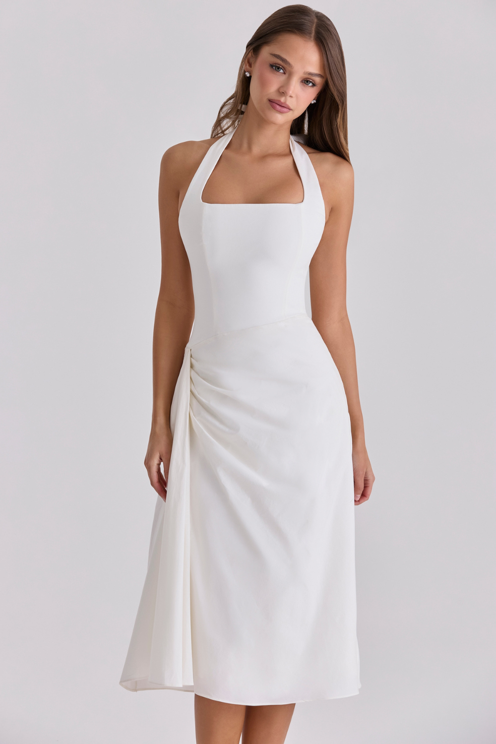 Ivory halter-neck midi dress with draped skirt, front view on model