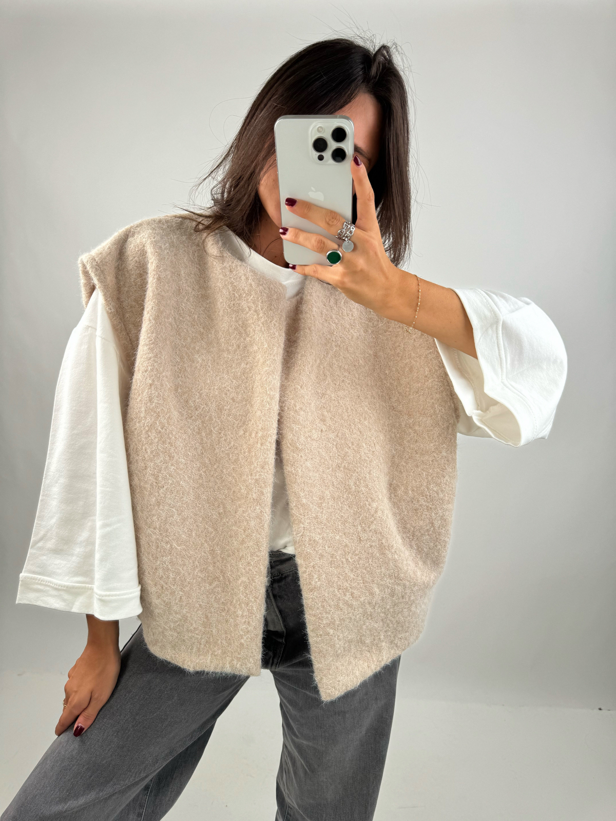 Beige bouclé knit vest open front, mirror selfie on model