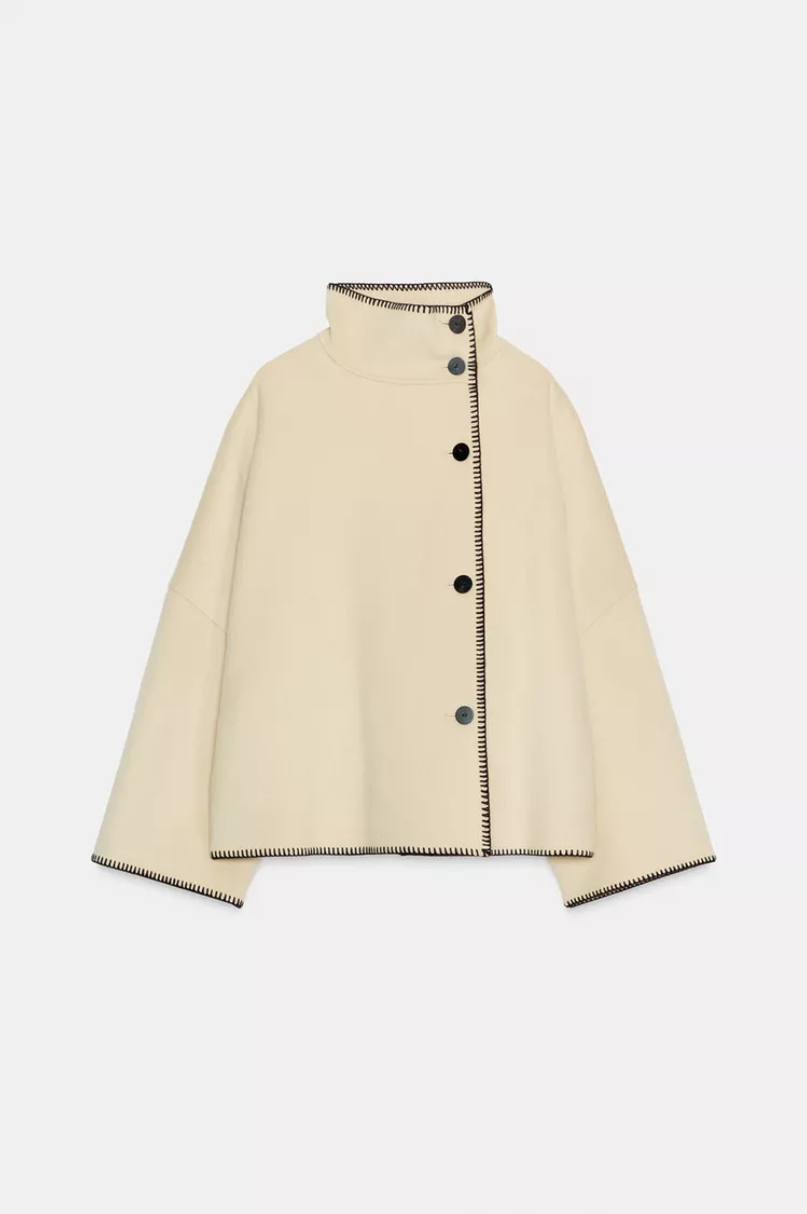 Cream wool jacket with contrast stitch edging, flat lay
