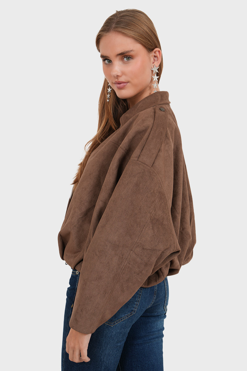 Coffee brown suede bomber jacket, side view on model