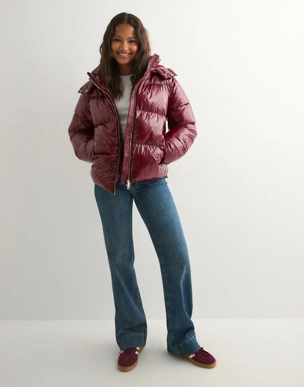 Wine red glossy hooded puffer jacket, full-length front view