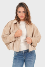 Beige suede bomber jacket, front view on model