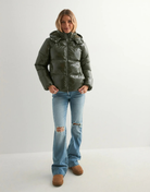 Green glossy hooded puffer jacket, full-length front view zipped