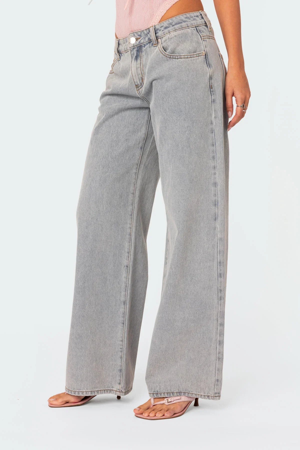 Grey wide-leg jeans, close-up side view on model