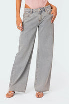Grey wide-leg jeans, close-up front view on model