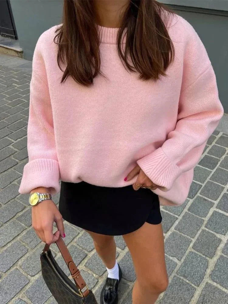 Close-up of pink oversized jumper sleeve and ribbed hem