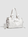 White vintage-style weave bag with braided trim, angled front view