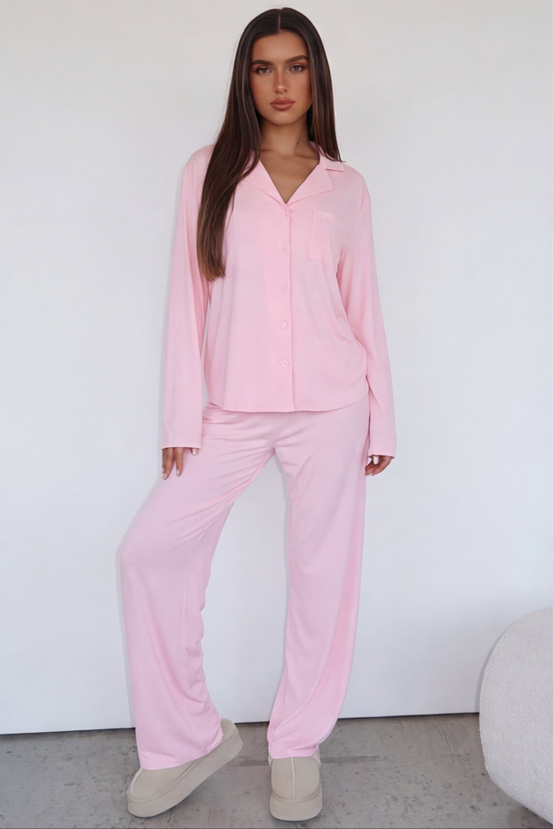 Pink long-sleeve pyjama set with trousers, full length front view
