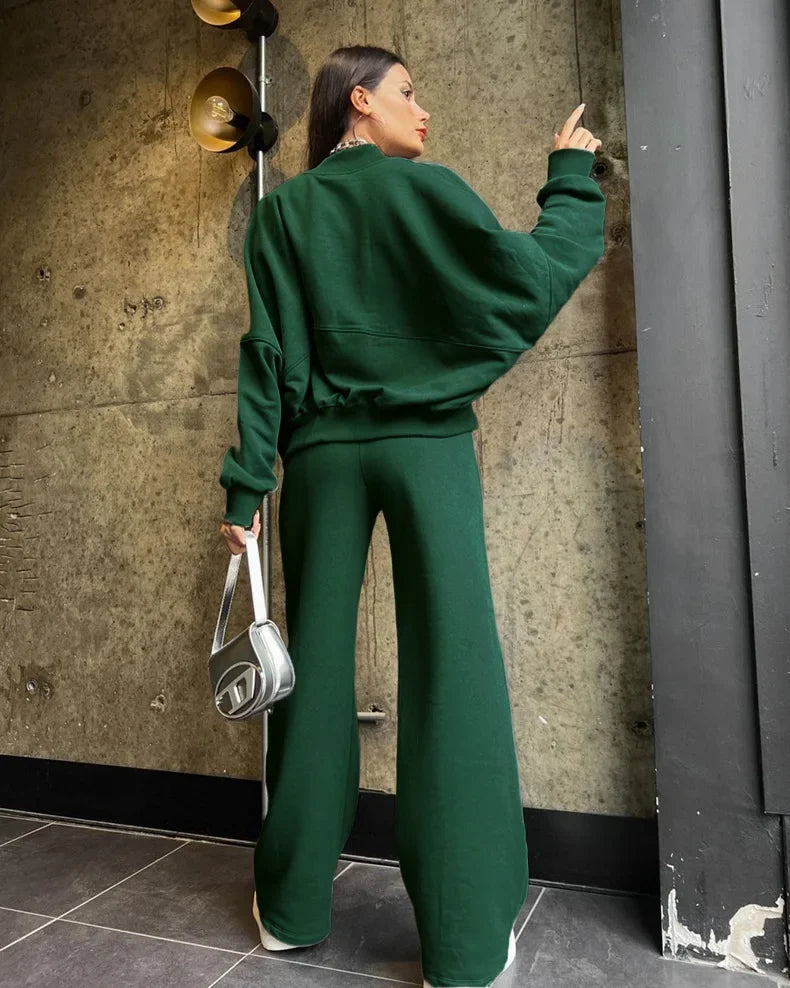 Green oversized hoodie and joggers set, back view on model