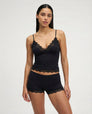 Black lace-trim pyjama set, cami and shorts, front view on model