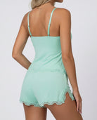 Back view of mint green lace-trim cami and shorts pyjama set