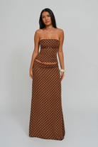 Cocoa dot corset top and wrap maxi skirt, front view on model