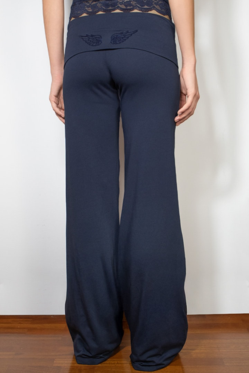 Navy joggers with tonal wing print on waistband, back view on model