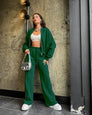 Green oversized zip-up hoodie and joggers set, front view on model