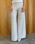 White stripe wide-leg trousers, close-up front view