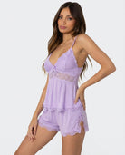 Light purple lace-trim pyjama set, side view, hand on hip