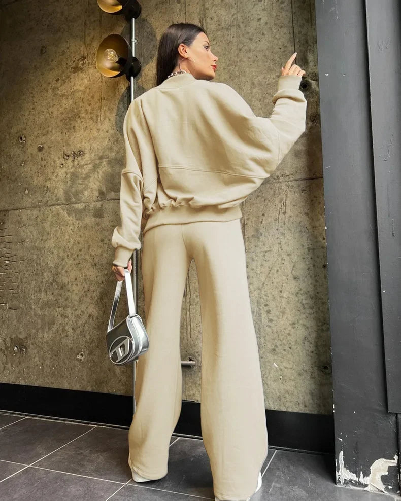 Beige oversized hoodie and joggers set, back view on model