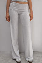 Grey joggers with fold-over waistband, front view on model