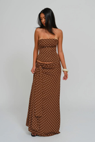 Cocoa dot corset top and wrap maxi skirt, three-quarter front view