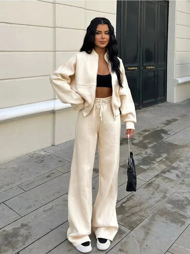 Beige zip-up jacket and wide-leg joggers set, full length on model
