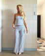Blue stripe halter top and trousers set, full length on model