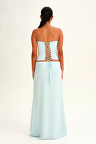 Mist blue lace-up corset top and wrap maxi skirt, back view on model