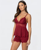 Burgundy lace-trim pyjama set, three-quarter front view on model