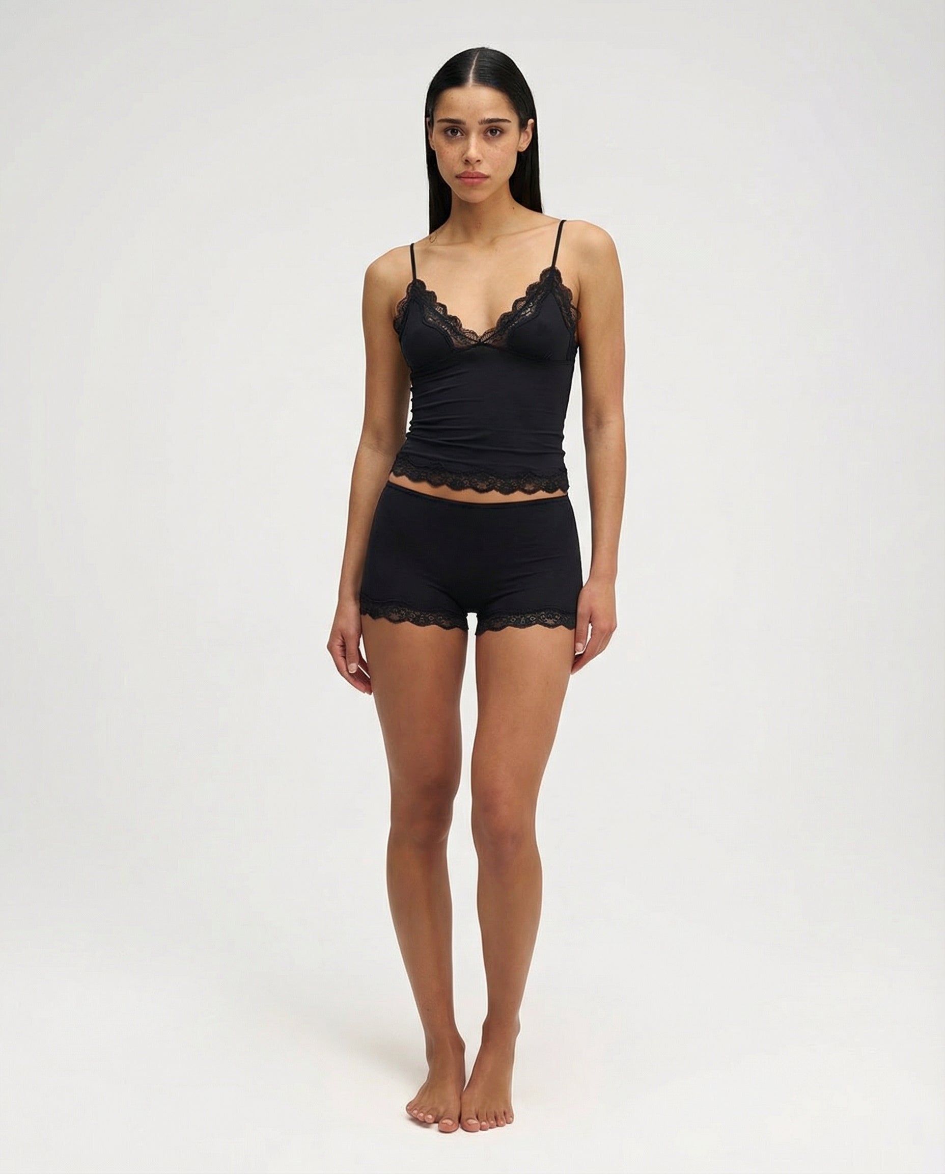 Black lace-trim pyjama set, full length front view on model