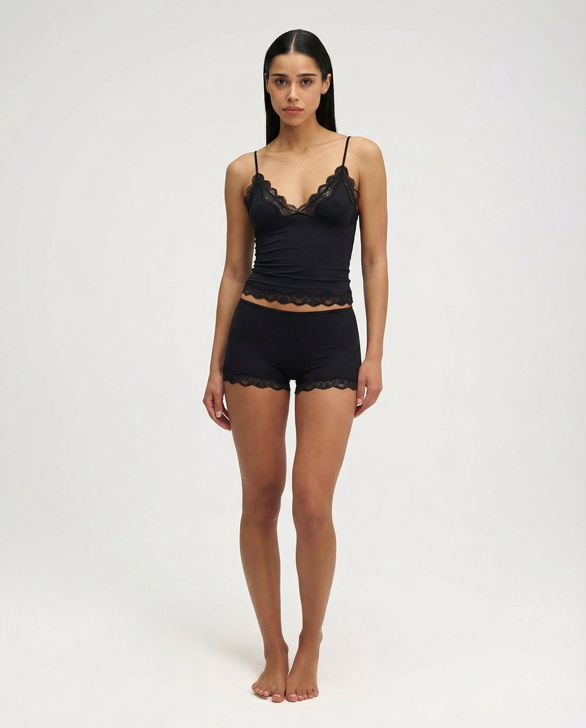 Black lace-trim pyjama set, full length front view on model