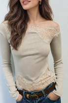 Beige asymmetric lace top, front view