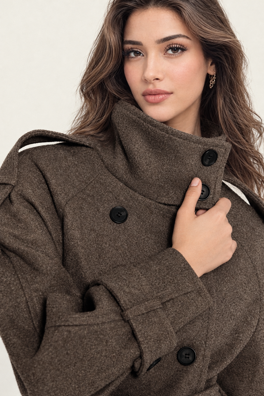 Brown trench coat with high collar, front view