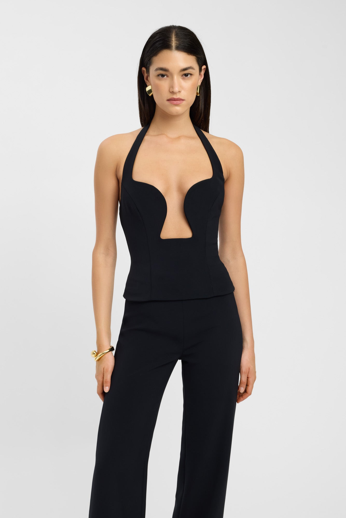 Black plunge bustier top, close-up front view on model
