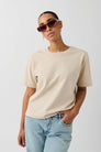Warm sand cotton crew neck t-shirt, front view on model