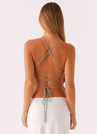 Mint sequin floral cami top, back view with crisscross straps