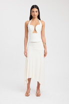 White plunge bustier top styled with midi skirt, front view